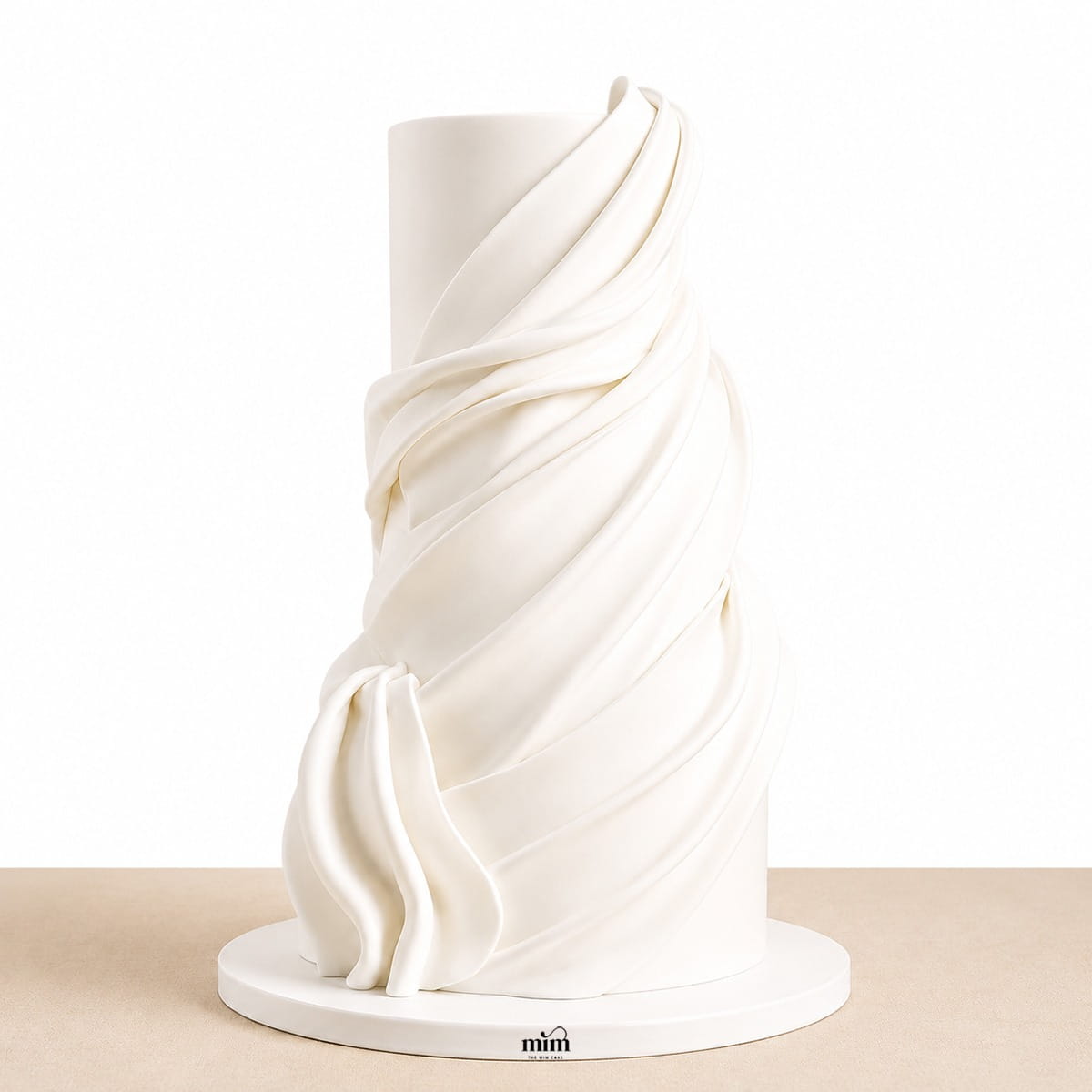 WhatsApp Image 2026-06-27 at 1.44.21 PM Ivory Draped Sculpture Cake - Image 1