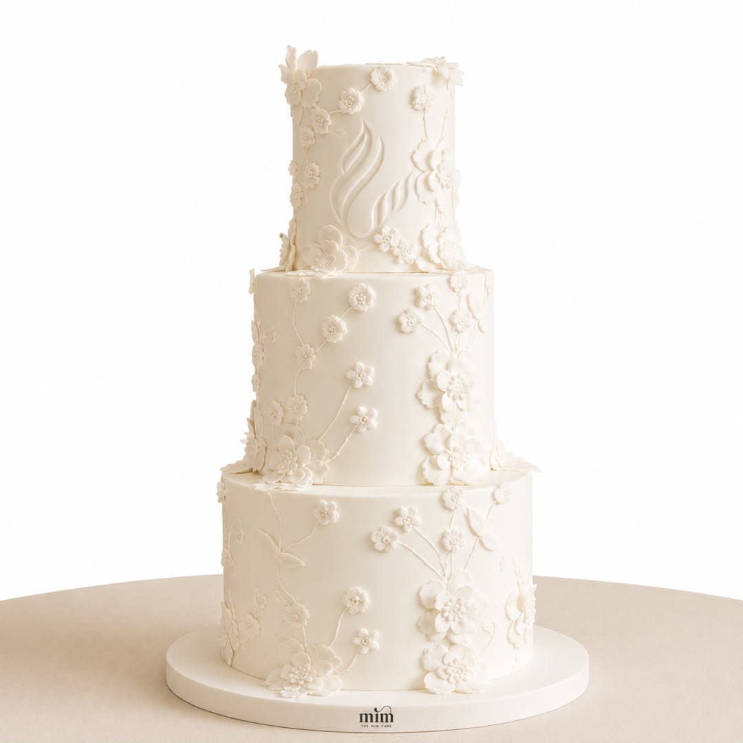 WhatsApp Image 2026-07-06 at 3.10.23 PM Elegant Three-Tier White Floral Wedding Cake. - Image 1