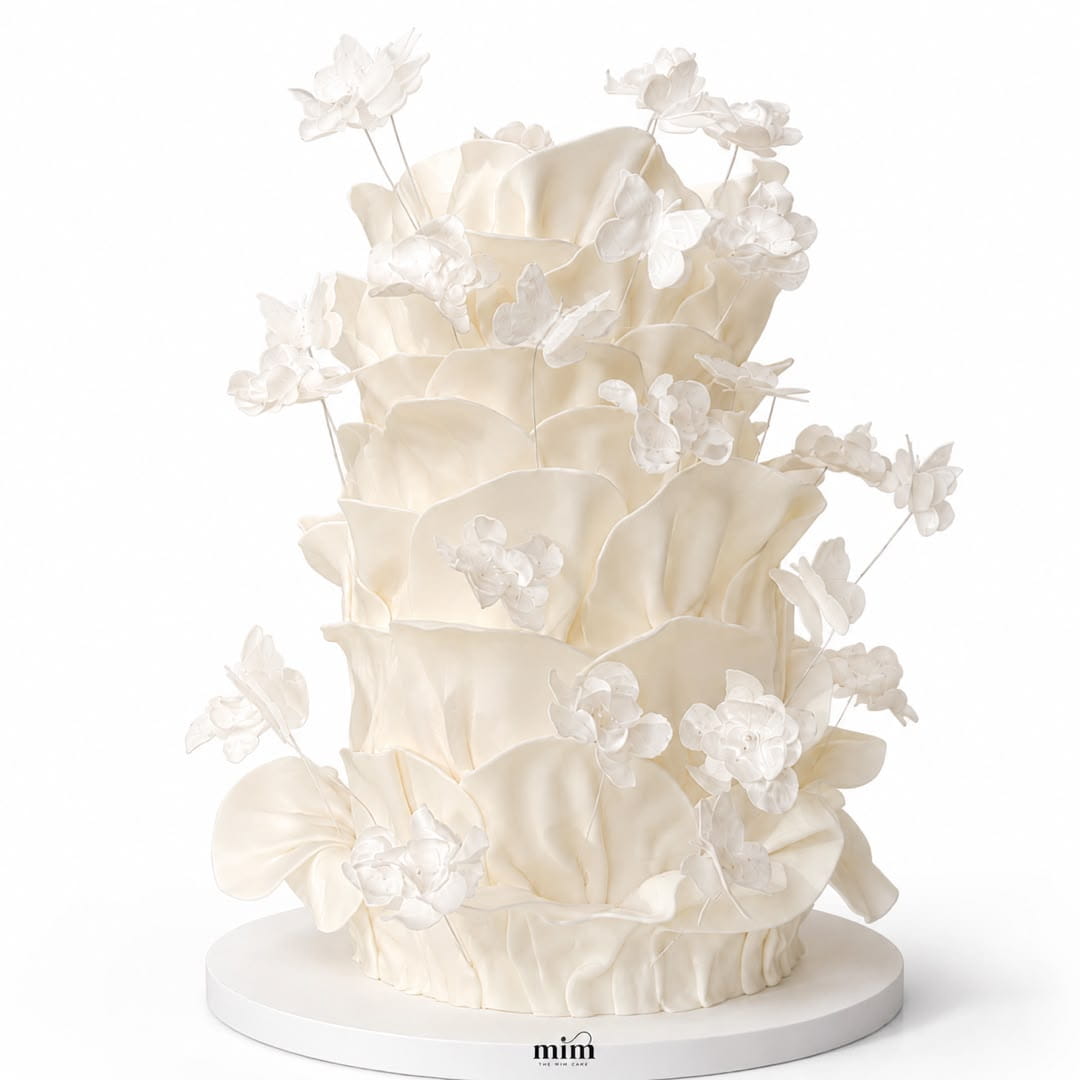 WhatsApp Image 2026-07-06 at 3.23.01 PM White Ruffle & Butterfly Cake. - Image 1