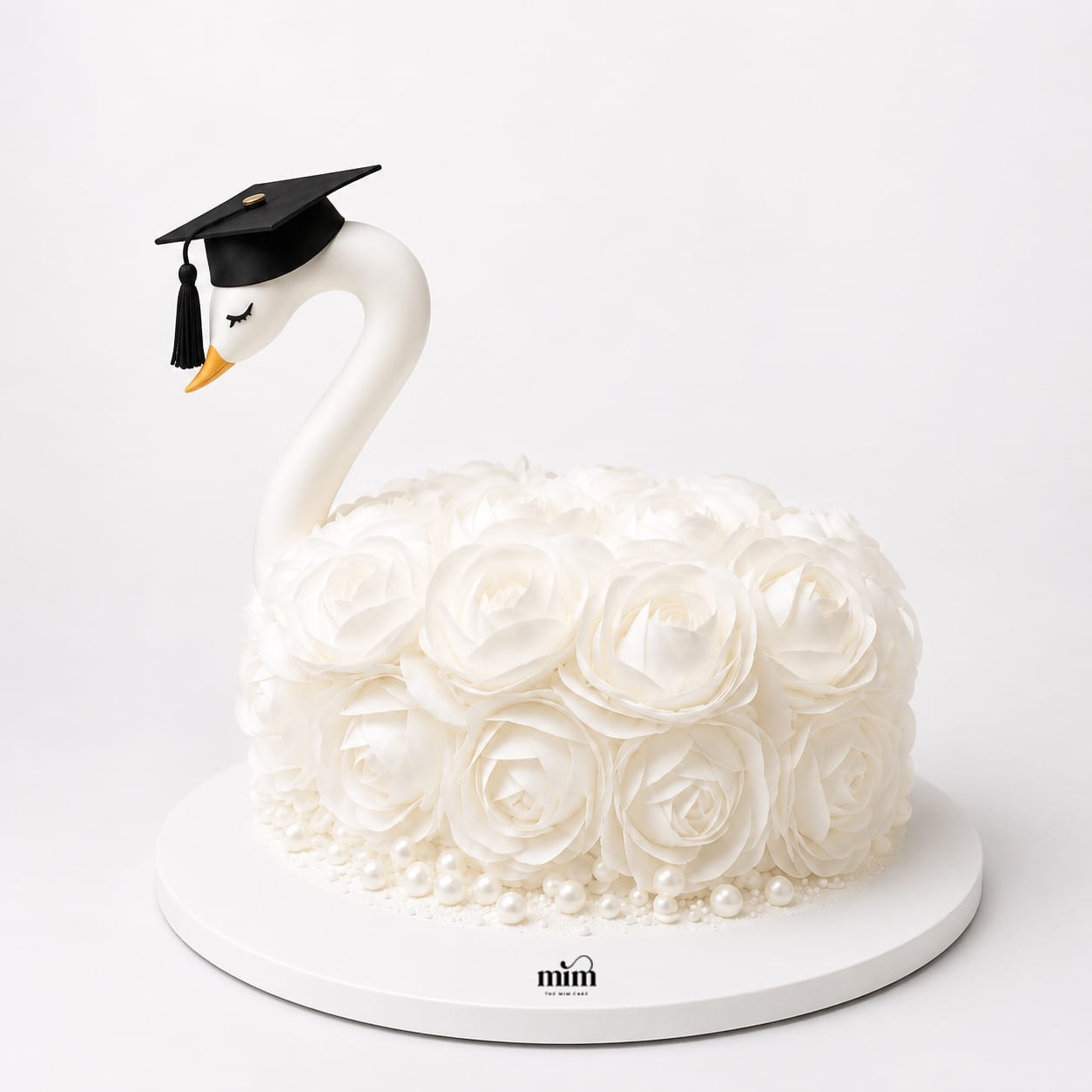 WhatsApp Image 2026-07-10 at 11.45.03 AM White Swan Graduation Cake - Image 1