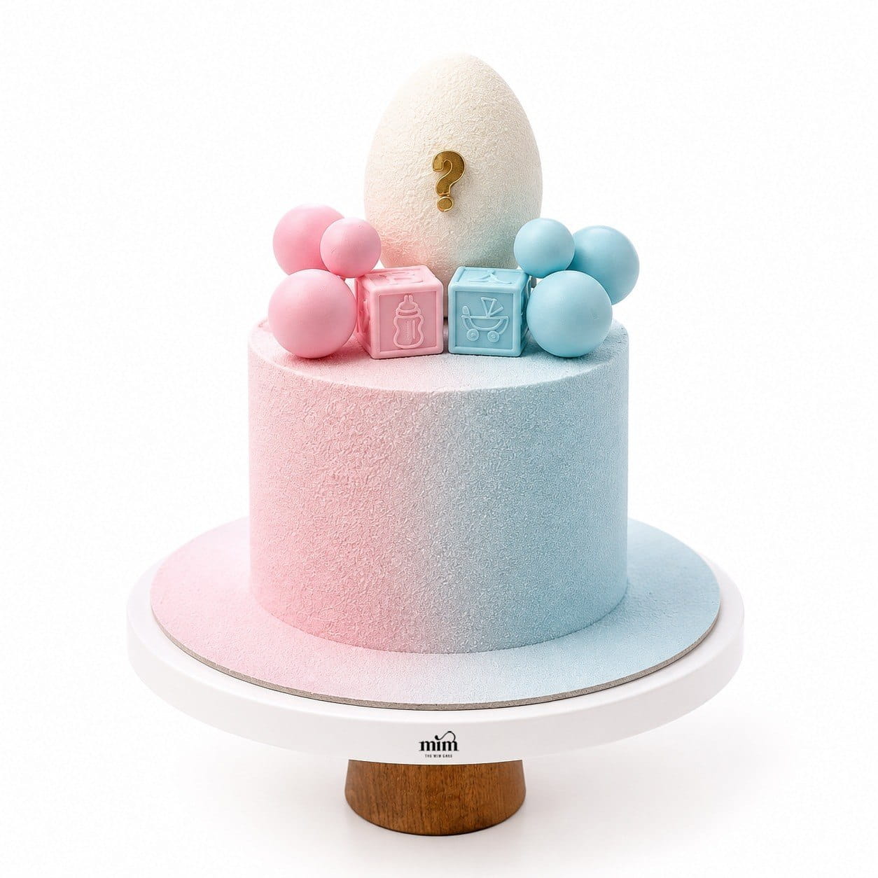 Pastel Gender Reveal Cake 💙🩷 A modern gender reveal cake with a soft pink and blue gradient finish, featuring a surprise egg design, pastel baby blocks, and elegant minimalist details for a memorable celebration. 670 Pastel Gender Reveal Cake 💙🩷 - Image 1